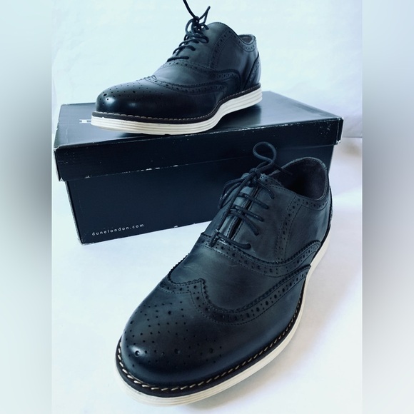 NEW Dune Mens 10 US BAYSIDE BLACK LEATHER WINGTIP WHITE WEDGE SOLE UK 44 - Picture 1 of 11